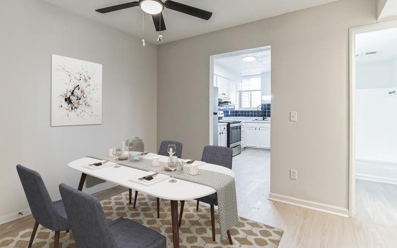 a dining table with chairs around it